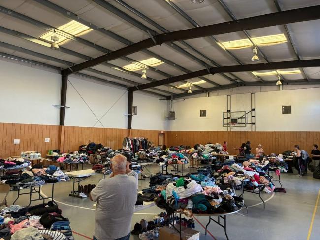 clothing donations on tables