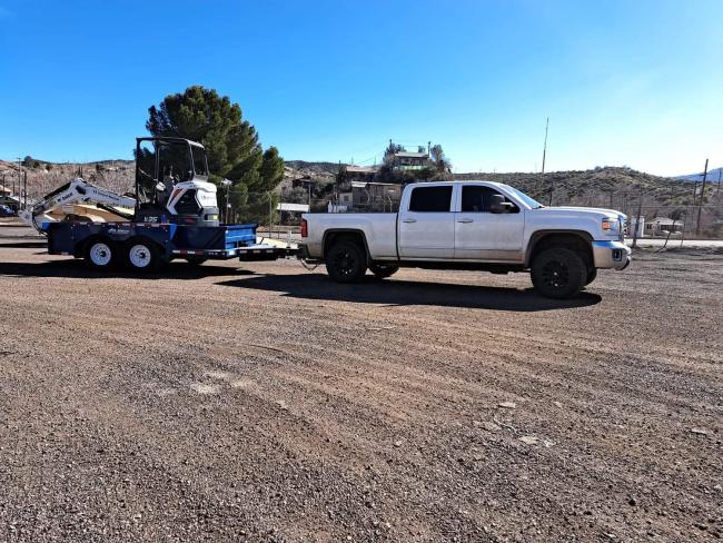 truck with equipment on trailer